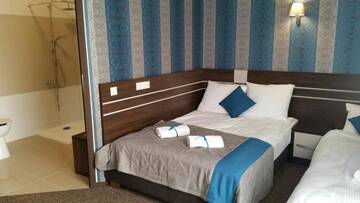 Фото номера Трехместный номер Отель Hotel Impressa г. Niedrzwica Duża 3